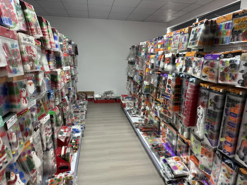 Custom gel cling retail display showing a broad packaged product range